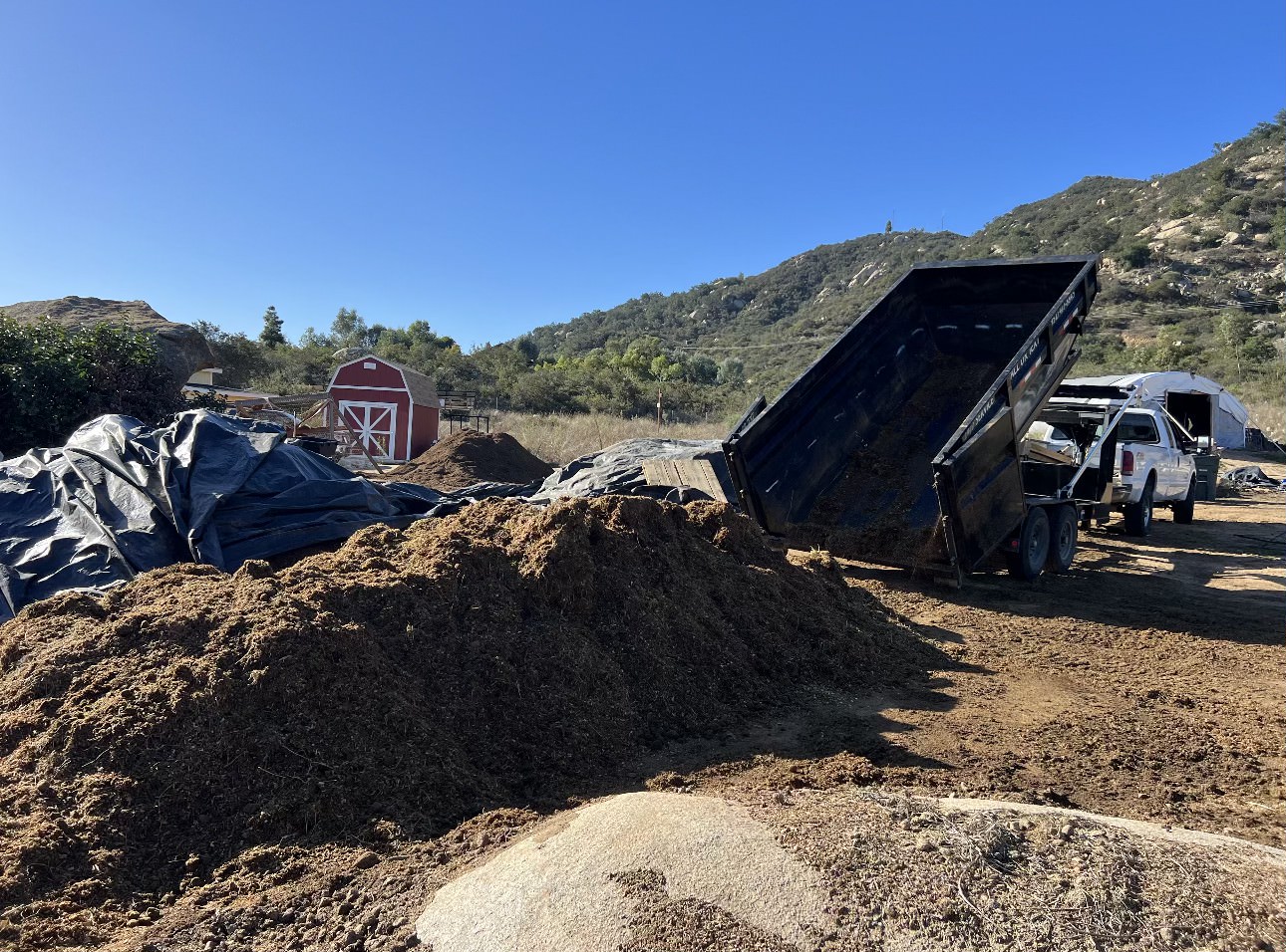 Manure disposal dumpster ready for agricultural waste in Riverside County